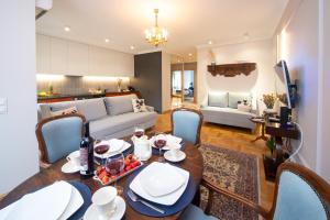 Posezení v ubytování Maya's Flats & Resorts 102 - Premium Apartment Prz