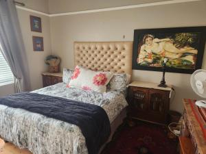 Postel nebo postele na pokoji v ubytování Strand Beach House