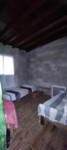 Postel nebo postele na pokoji v ubytování NATURAL Tanti Lomas