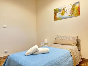 Ένα ή περισσότερα κρεβάτια σε δωμάτιο στο Alba Vesuviana B&B