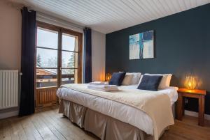 Postel nebo postele na pokoji v ubytování Chalet 715