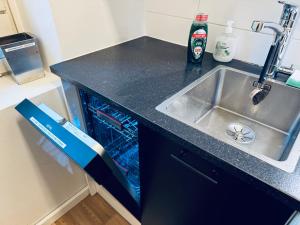 Kuchyň nebo kuchyňský kout v ubytování STAY Kamppi Center Apartment + 14 fotografií