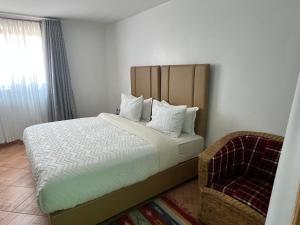 Ένα ή περισσότερα κρεβάτια σε δωμάτιο στο Mara Balanite Hotel