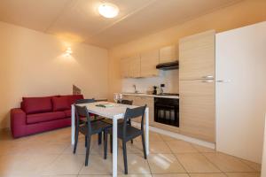 Kuchyň nebo kuchyňský kout v ubytování La Fornace - Rooms & Pool