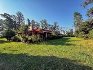 Photo de la galerie de l'établissement Casa de Verano en Ypacaraí con lago natural, Piscina, Naturaleza y Comodidad para Grupos, à Ypacarai