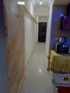 Μια τηλεόραση ή/και κέντρο ψυχαγωγίας στο بلوباى آسيا العين السخنه