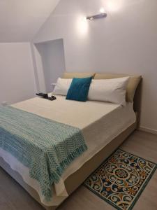 Ένα ή περισσότερα κρεβάτια σε δωμάτιο στο Casa Barozzi 1908