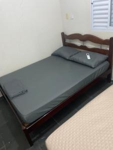 a bed sitting in a room with a mattress at Albuquerque nro36 casa 3 in Campinas