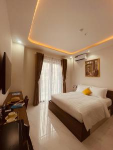 Ένα ή περισσότερα κρεβάτια σε δωμάτιο στο Soi by La Doma Express