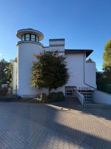 a lighthouse on the side of a building at Moderne Ferienwohnung an der Ostsee im Haus Leuchtfeuer in Diedrichshagen