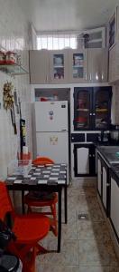 Η κουζίνα ή μικρή κουζίνα στο Chambre privée avec terrasse