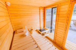 an inside view of a wooden sauna at Villa Klosterschenke Sauna Whirlpool Game Room in Sankt Goarshausen