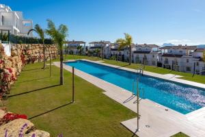 an image of a swimming pool at a house at Golden View 2460 in Manilva