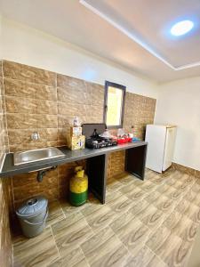 Una cocina o cocineta en Residence Hamada Laayoune - Family & Traveler Apartments