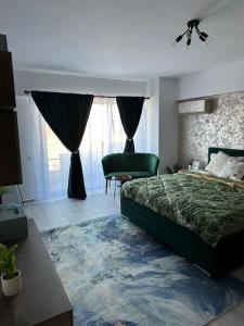 Postel nebo postele na pokoji v ubytování Lucas Apartament 2