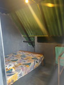 Postel nebo postele na pokoji v ubytování The black hut villa + 5 fotografií