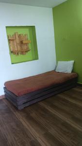 En eller flere senge i et værelse på Cloudy stay