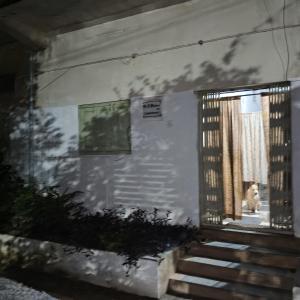 Hoone, kus külalistemaja asub +7 fotot