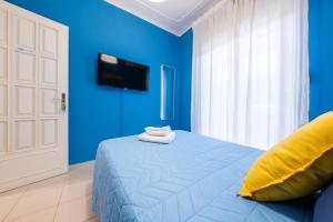 TV a/nebo společenská místnost v ubytování Casa Sapio vista mare