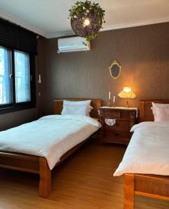 Ένα ή περισσότερα κρεβάτια σε δωμάτιο στο Staydrock