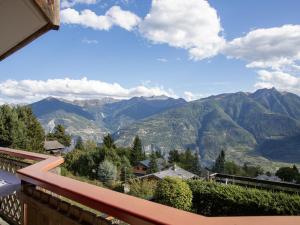 a view of the mountains from a balcony at Apartment Ardève 7 by Interhome in Ovronnaz