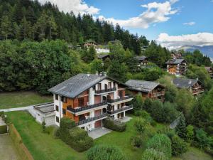 an aerial view of a house in the mountains at Apartment Roc Lyv by Interhome in Ovronnaz
