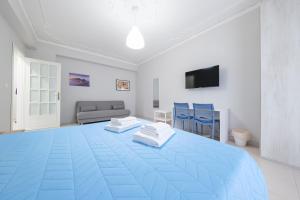 Postel nebo postele na pokoji v ubytování Casa Sapio vista mare