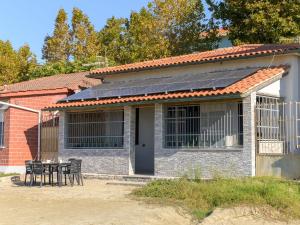a house with solar panels on the roof at Holiday Home Sogno di Mare by Interhome in Follonica