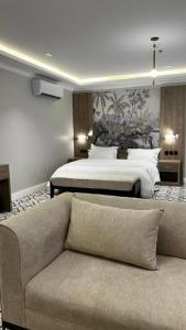 Postel nebo postele na pokoji v ubytování فندق فاتوران