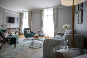 TV a/nebo společenská místnost v ubytování Victoria Jungfrau Grand Hotel & Spa