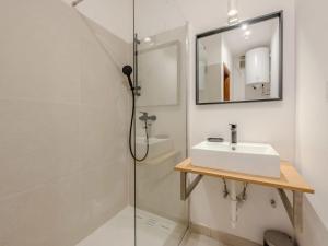 a bathroom with a sink and a shower at Holiday Home Maier by Interhome in Arco