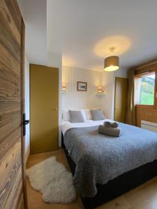 Postel nebo postele na pokoji v ubytování Appartement 4 chambres Morzine LAIR