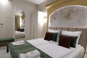 En eller flere senge i et værelse på Ивелия Хотел и Спа - Ivelia Hotel & SPA + 38 billeder