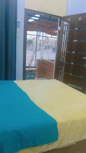 Katil atau katil-katil dalam bilik di Onaty Narty Guest house