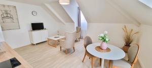 TV a/nebo společenská místnost v ubytování Résidence de Châtelleraut