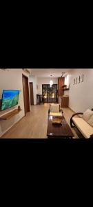 TV a/nebo společenská místnost v ubytování Enjoy and relax living villa style at anggrek mas 2