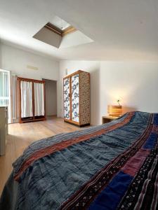 a bedroom with a large bed in a room at Riviera Bella Ponente in Cesenatico