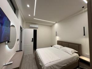 TV a/nebo společenská místnost v ubytování Hotel Gramozi