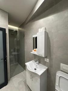Koupelna v ubytování Hotel Gramozi + 65 fotografií