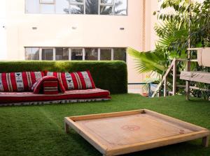 a living room with a couch and a coffee table at استراحة روضة الوادي - Rawdat Al Wadi House in Nizwa