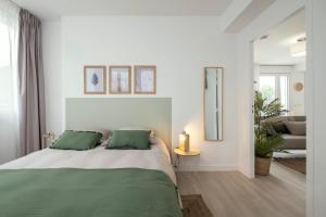 Postel nebo postele na pokoji v ubytování Résidence de Châtelleraut