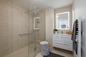 Koupelna v ubytování Résidence de Châtelleraut + 14 fotografií