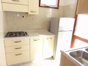 Kuchyň nebo kuchyňský kout v ubytování Family villa with private garden near the beach + 12 fotografií