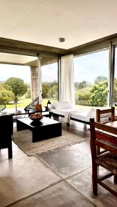 Posezení v ubytování Casa Las Vistillas -La Pedrera- con lago privado a metros del Mar