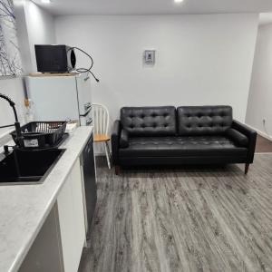 Kuchyň nebo kuchyňský kout v ubytování Cute & Spacious 2 BDR condo
