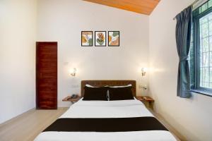 Krevet ili kreveti u jedinici u okviru objekta Hotel O Citrus Resort