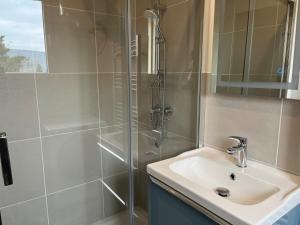 Koupelna v ubytování Le Petit Rustique