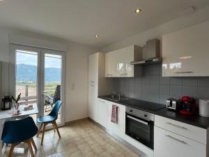 Kuchyň nebo kuchyňský kout v ubytování Le Petit Rustique