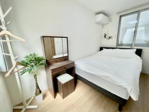 Voodi või voodid majutusasutuse Bisk Park Higashijujo - Vacation STAY 83637v toas