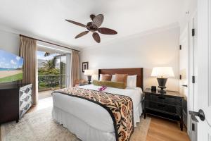 a bedroom with a bed and a large window at Maui Luxury Mountain-View Villa at Honua Kai in Lahaina +44 photos